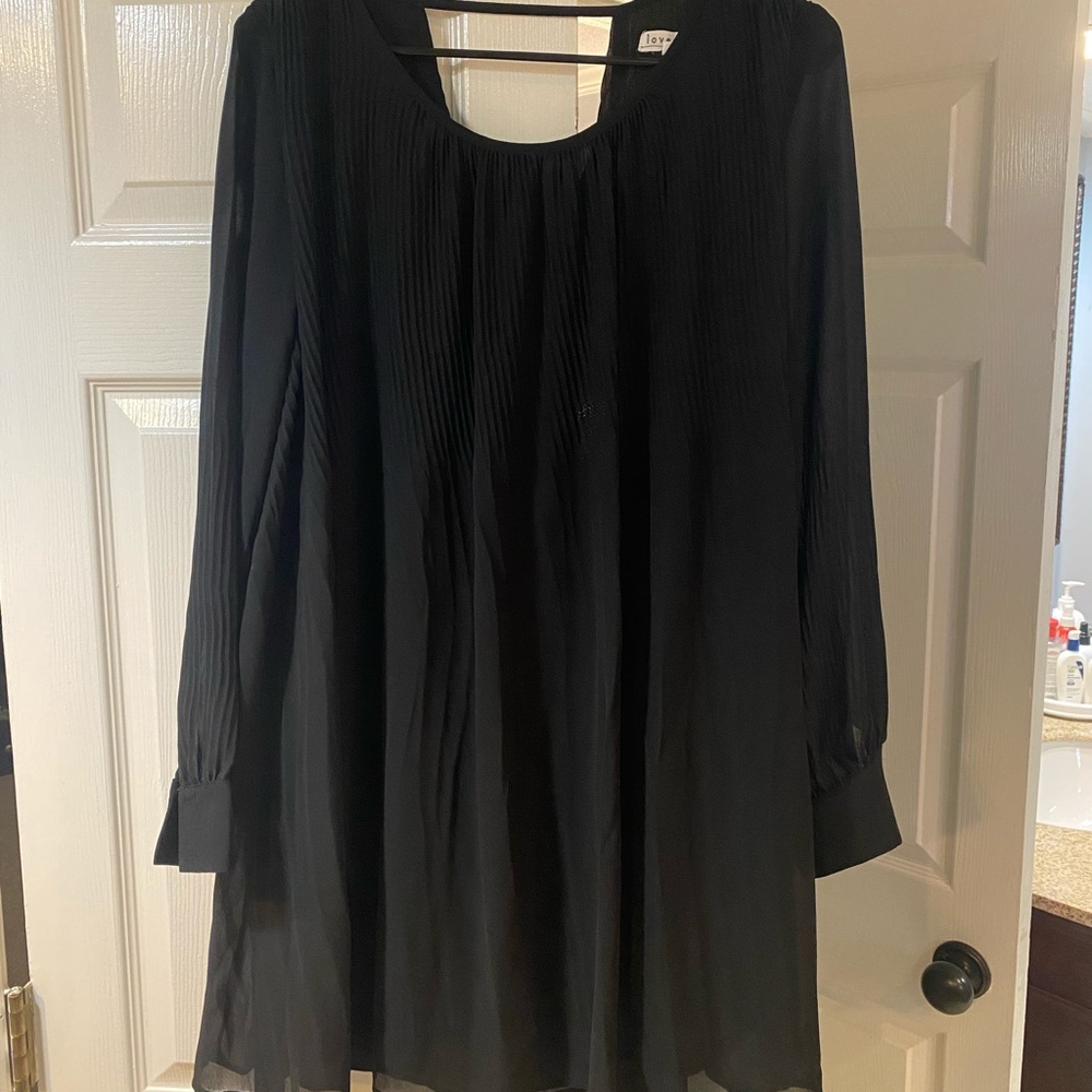 Flowy, black dress with pleated detail. Size small.